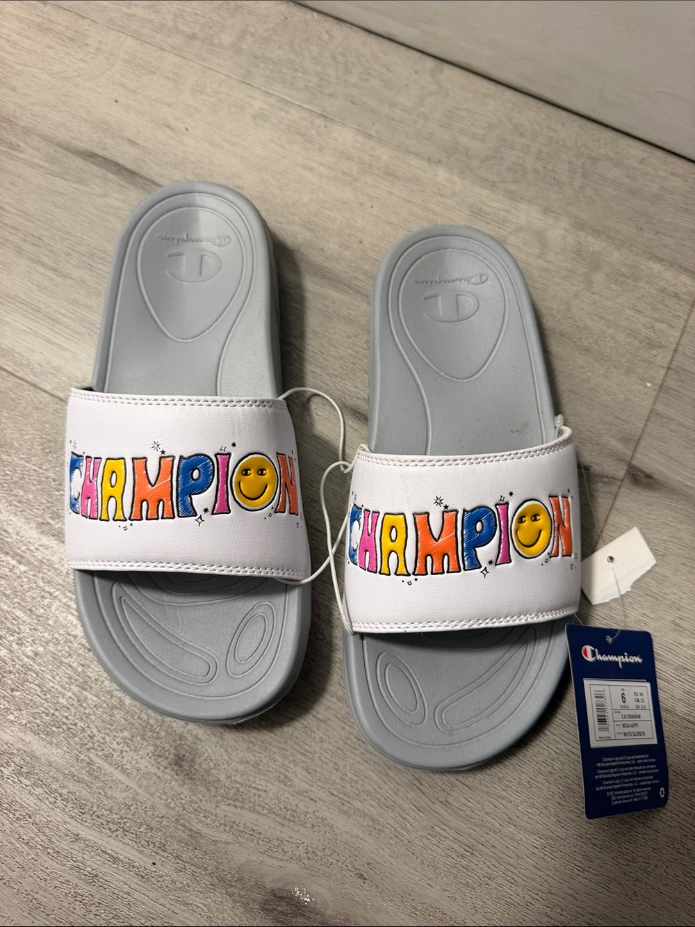 Champion women’s White Slide Sandals with Multicolor Logo